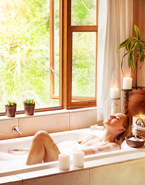 istock Happy woman bathing 495438720