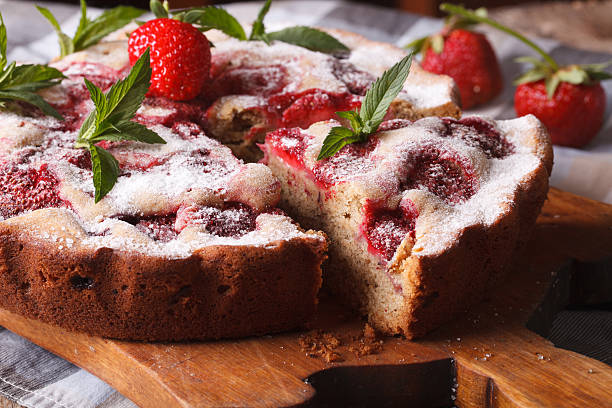 istock strawberry pie with mint on a cutting board macro. Horizontal 495439620