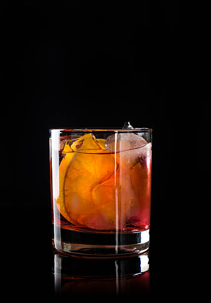 Old fashioned cocktail Old fashioned cocktail on the black background amber black photography stock pictures, royalty-free photos & images