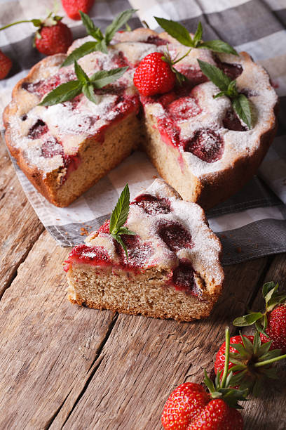istock Homemade sliced strawberry pie close-up. Vertical rustic style 495440560
