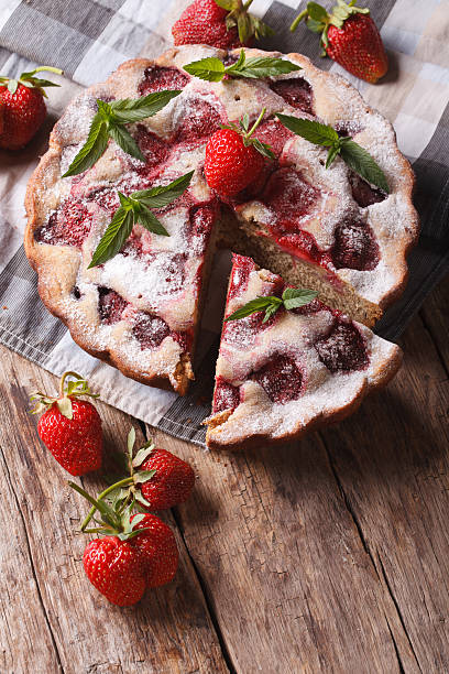 istock Strawberry pie close-up vertical top view of rustic style 495441210