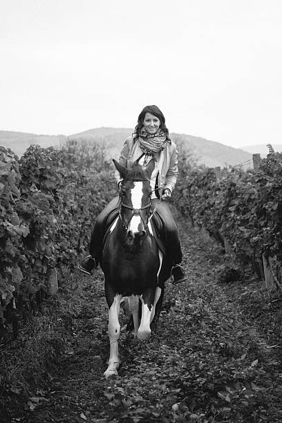 istock Front view, girl riding sprinting horse. 495441942