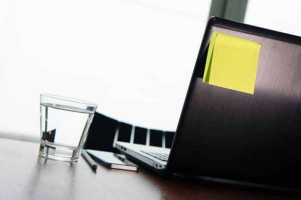 istock Office workplace with laptop and smart phone on wood table 495442550