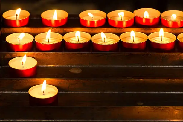 Close up of lines of tealights