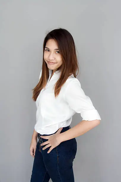 asian lady fight action with white shirt and jeans