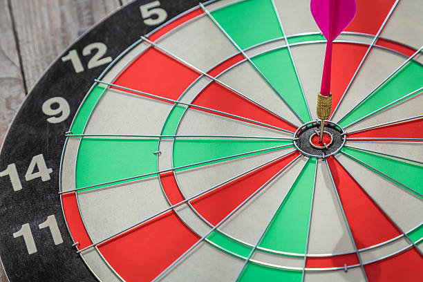 istock Dartboard on wood wall 495455760