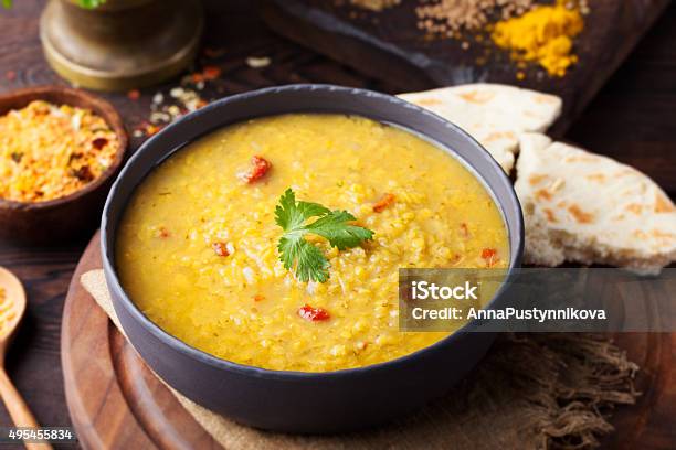 Red Lentil Indian Soup With Flat Bread Masoor Dal Stock Photo - Download Image Now