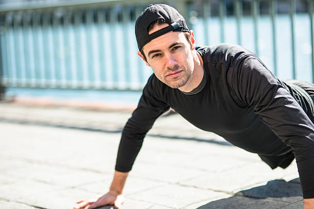 istock man doing pushups on the city 495457550