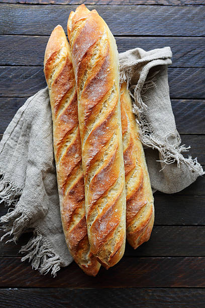 istock fresh baguette on napkin 495458294