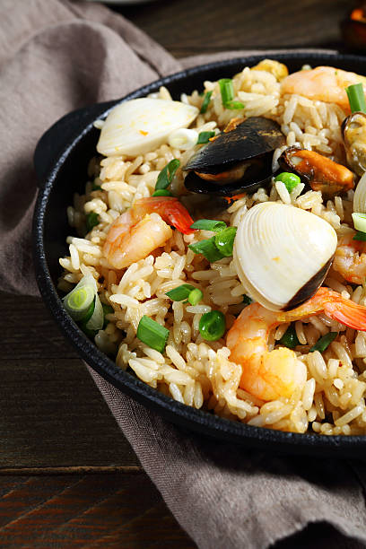 istock Fried rice with mussels and seafood 495458490