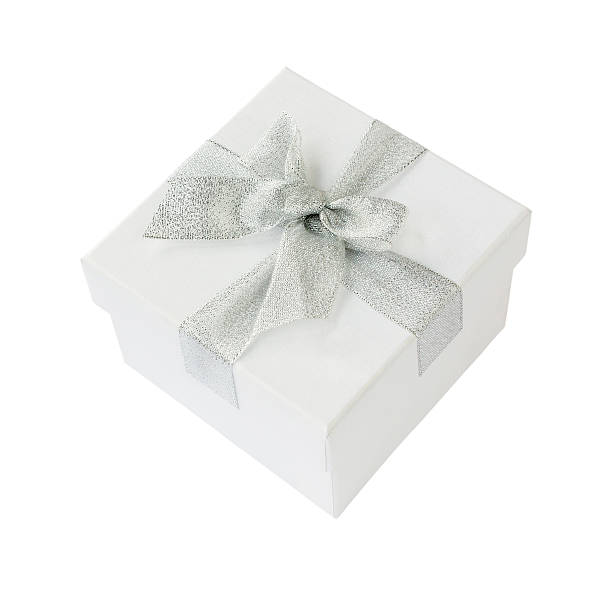 istock White gift box with yellow ribbon isolated over white 495458578