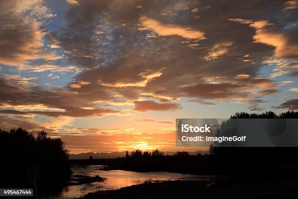 Sunset Over The Bow River Stock Photo - Download Image Now - Okotoks, 2015, Alberta