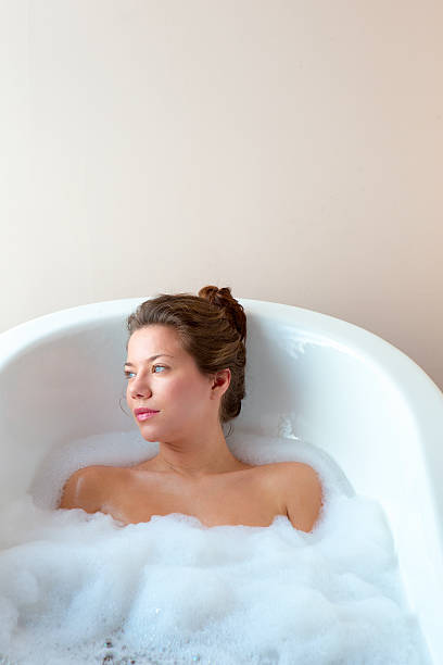 istock Woman in a Bubble Bath 495467569