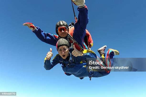 Skydiving Photo Tandem Stock Photo - Download Image Now - Skydiving, Parachuting, Tandem