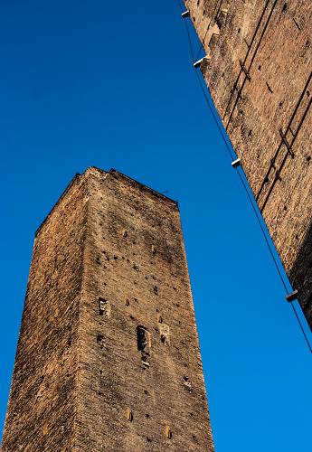 The Torre degli Asinelli and Torre dei Garisenda rise above the rooftops of Bologna, Italy.