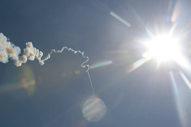 A rackete starts at the traditional rocket festival or Bun Bang Fai or Rocket Festival in Ban Si Than in the province of Amnat Charoen northwest of Ubon Ratchathani in northeastern Thailand in South-East Asia.