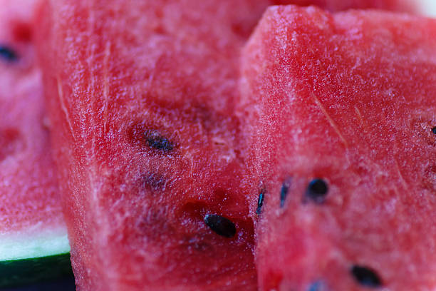 istock Juicy big red watermelon lying on a wooden table 495472956