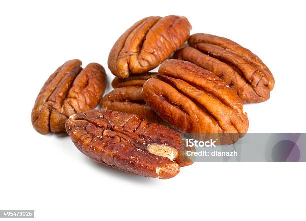 Pecan Nuts Isolated On White Background Stock Photo - Download Image Now - 2015, Arrangement, Brown