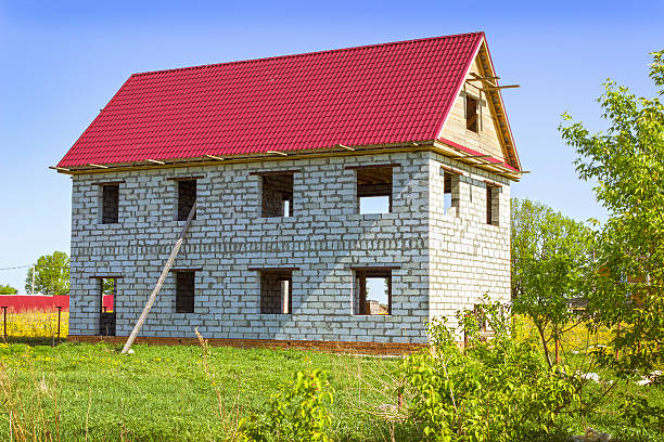 istock House from foam concrete blocks in the meadow 495473573