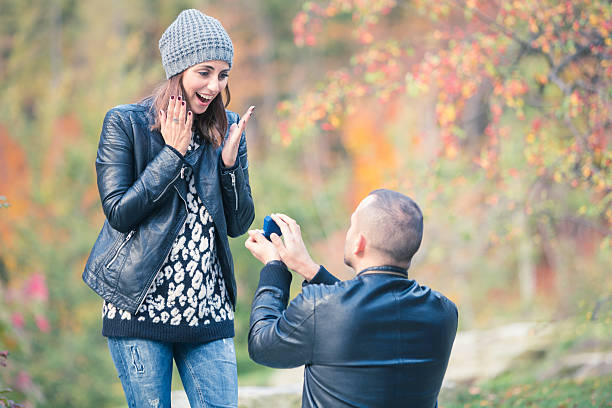 istock couple embracing in autumn mountain 495473890