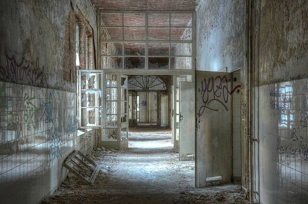 istock Old corridor in an abandoned hospital 495474057