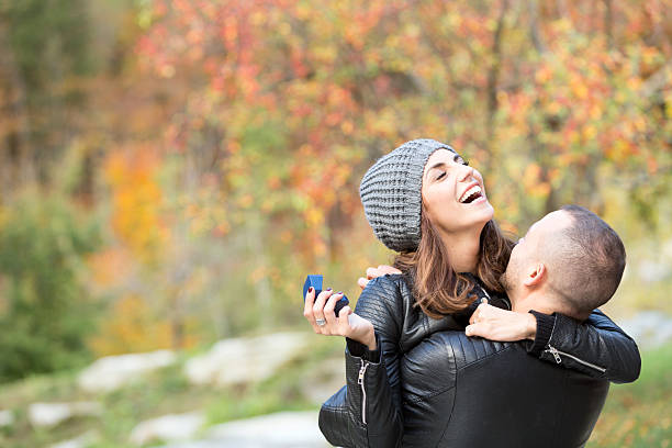 istock couple embracing in autumn mountain 495477794