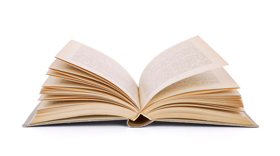 Close-up View Of Books On Table Of Library With Blurred Background