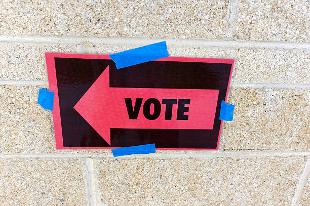 istock Voting Sign Taped to Wall 495479142