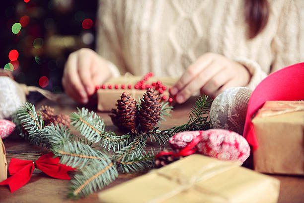 istock girl making Christmas presents 495479400