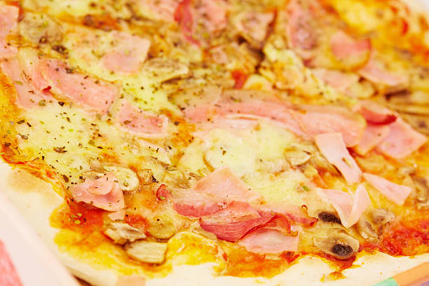 istock pizza with ham and mushrooms 495484142