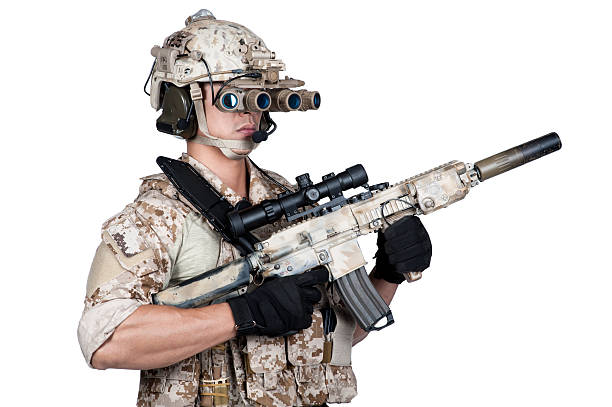istock soldier man full armor hold machine gun in isolated 495484910