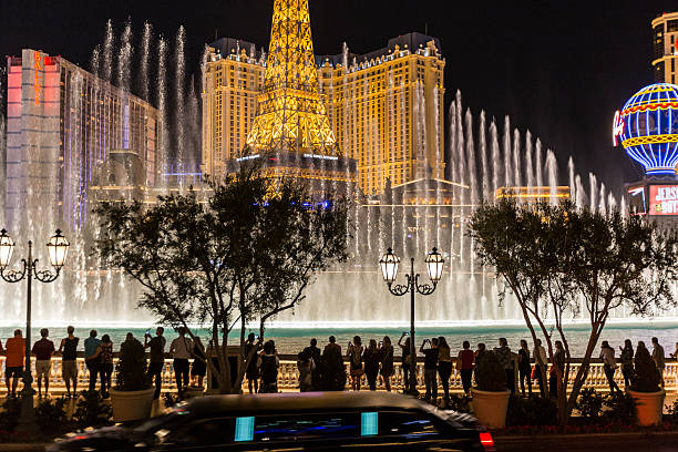 Las Vegas, USA - Sep 25, 2019: People watching the free Bellagio water show at twilight on the Strip early in the night.