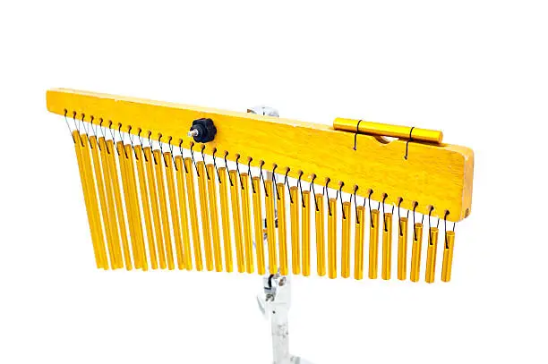 One set of bar chimes on white background. Image uses selective focusing and for background purposes only.