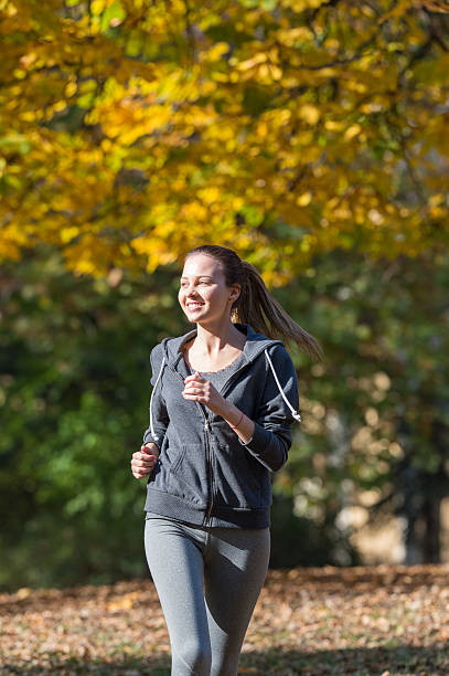 istock Pretty young girl  jogging 495497624