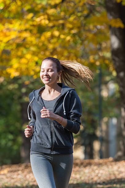 istock Pretty young girl  jogging 495497714