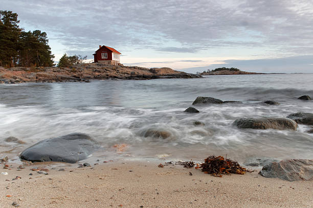 istock Archilelago and cottage in morning light 495503728