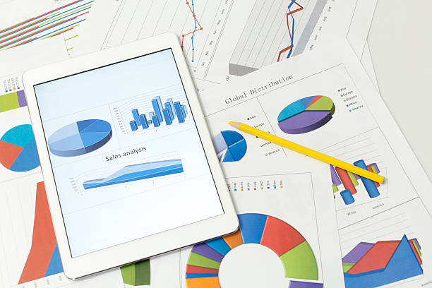 istock Financial charts on the table with tablet 495503774