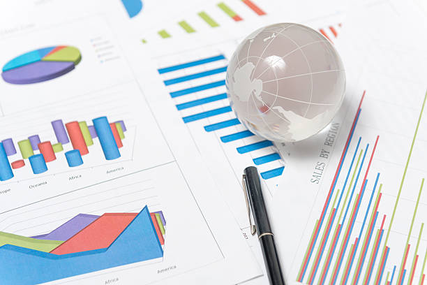 istock Business presentation with glboe and chart on the desk 495506078