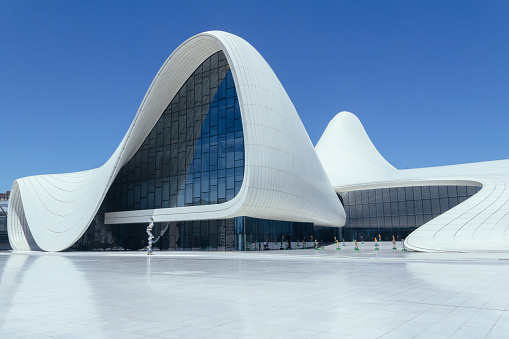 Baku, Azerbaijan-July 22, 2015: The Haydar Aliyev Centre was designed by Zaha Hadid and is noted for its curvy, flowing architecture that avoids straight lines and sharp angles. Currently the building houses an auditorium, a gallery and a museum.