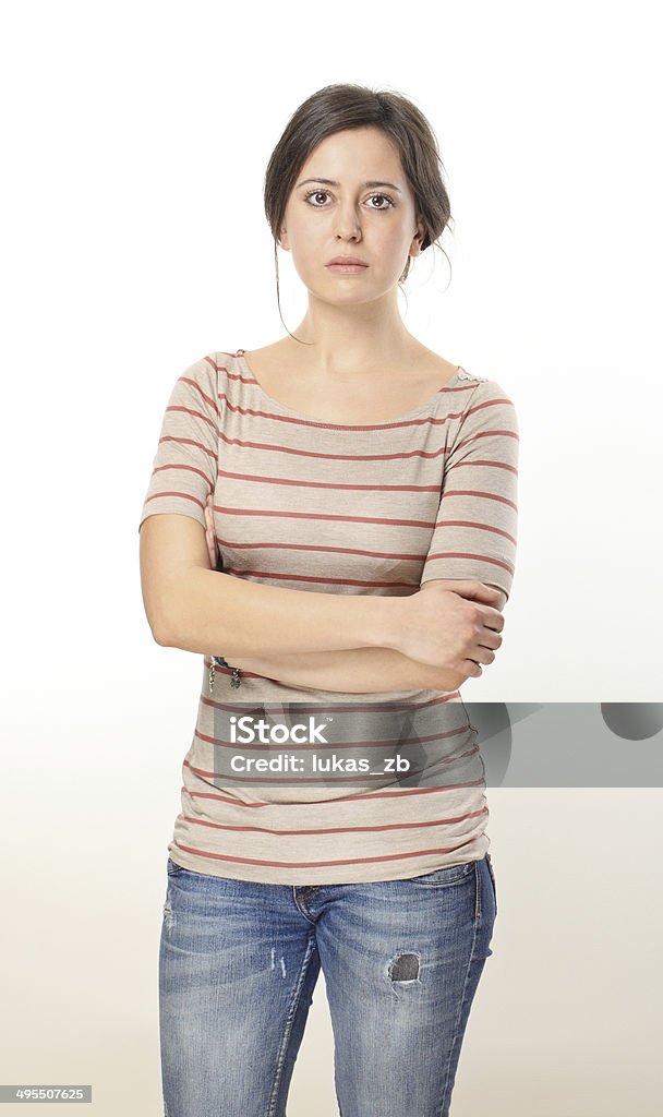 Sad Young Woman Portrait. Sad young woman portrait. White Background Stock Photo