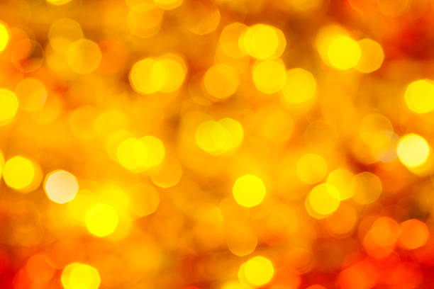 istock yellow and red blurred flickering Xmas lights 495507658
