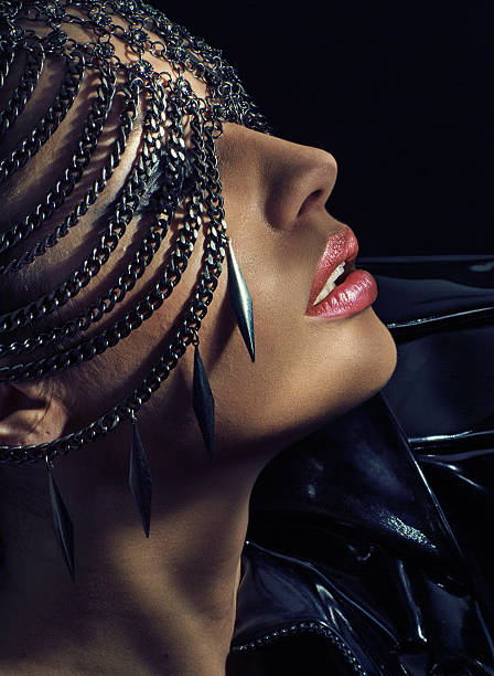istock Sensual lady wearing chain mask 495507767
