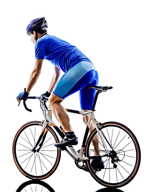istock cyclist cycling road bicycle rear view silhouette 495507795