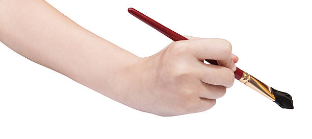 istock hand with art flat paint brush paints in black 495507990