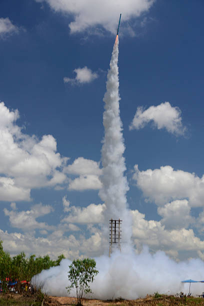 A rackete starts at the traditional rocket festival or Bun Bang Fai or Rocket Festival in Ban Si Than in the province of Amnat Charoen northwest of Ubon Ratchathani in northeastern Thailand in South-East Asia.