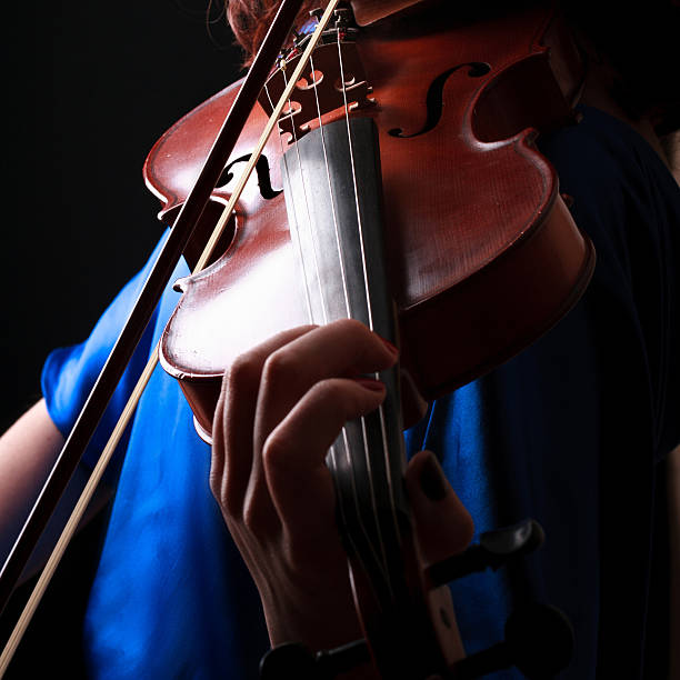 istock Violin playing violinist musician 495508963