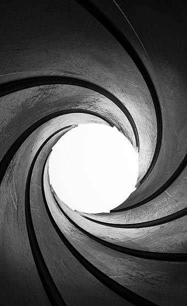 istock 3d abstract metal gun barrel focus concept illustration 495510577