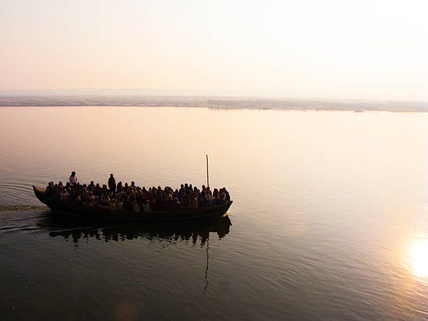 istock boatload of people in the ganges 495513177
