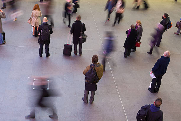 istock Blur Movement people in Rush Hour train station, London, UK 495514709