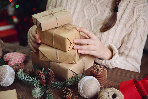 istock girl making Christmas presents 495519608